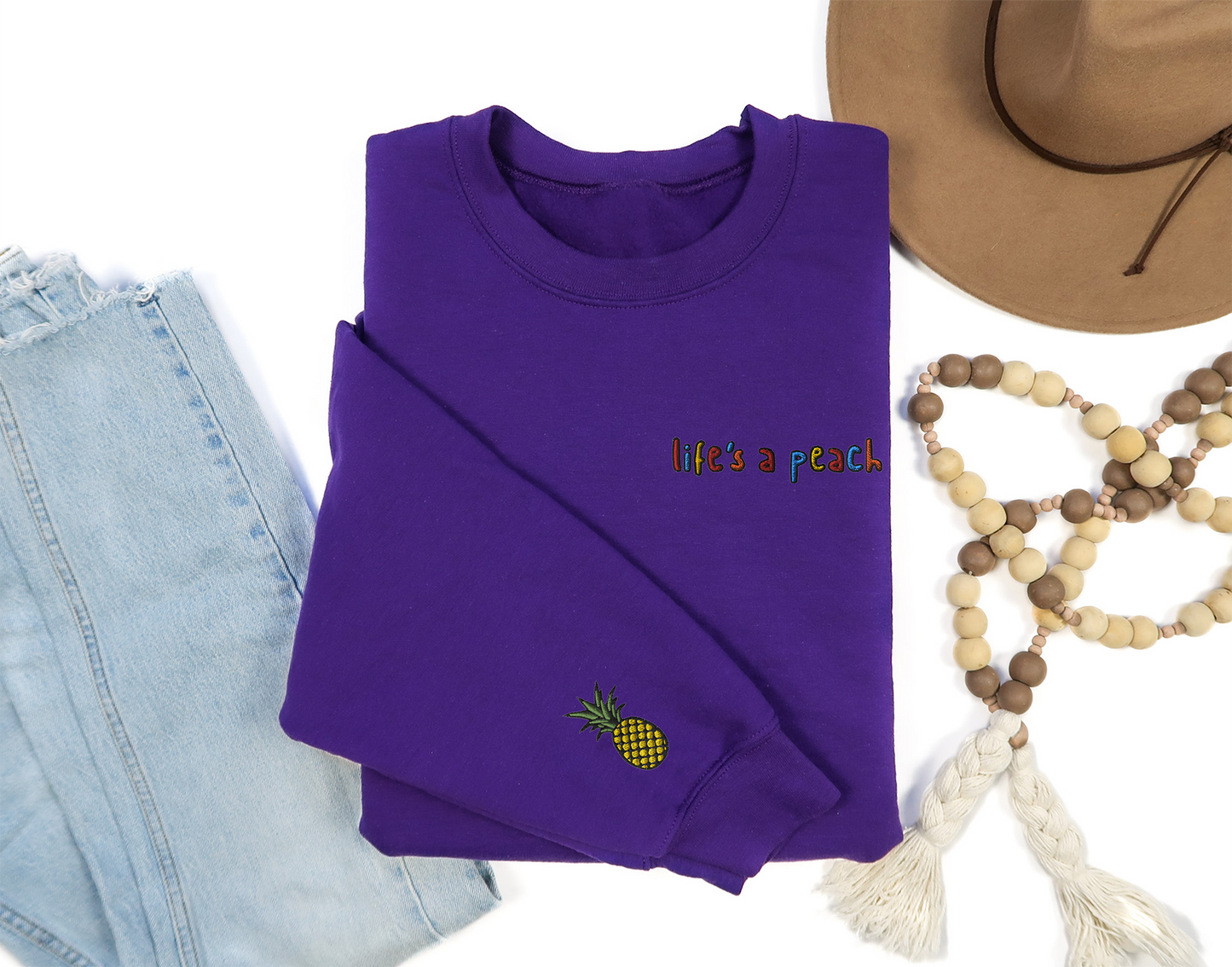 LIFE'S A PEACH - Embroidered Unisex Crewneck Sweatshirt
