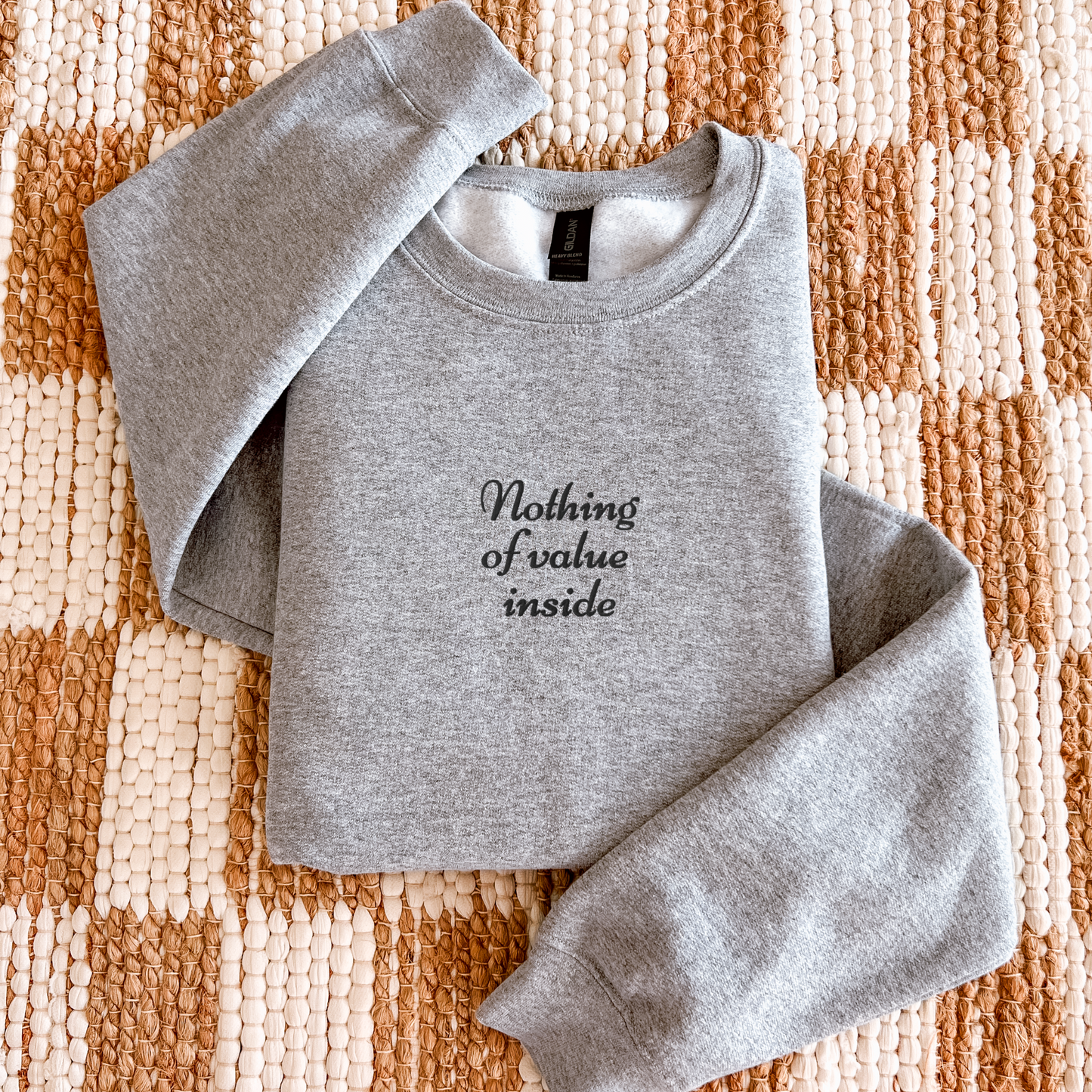 Nothing of Value Inside - Embroidered Unisex Sweatshirt