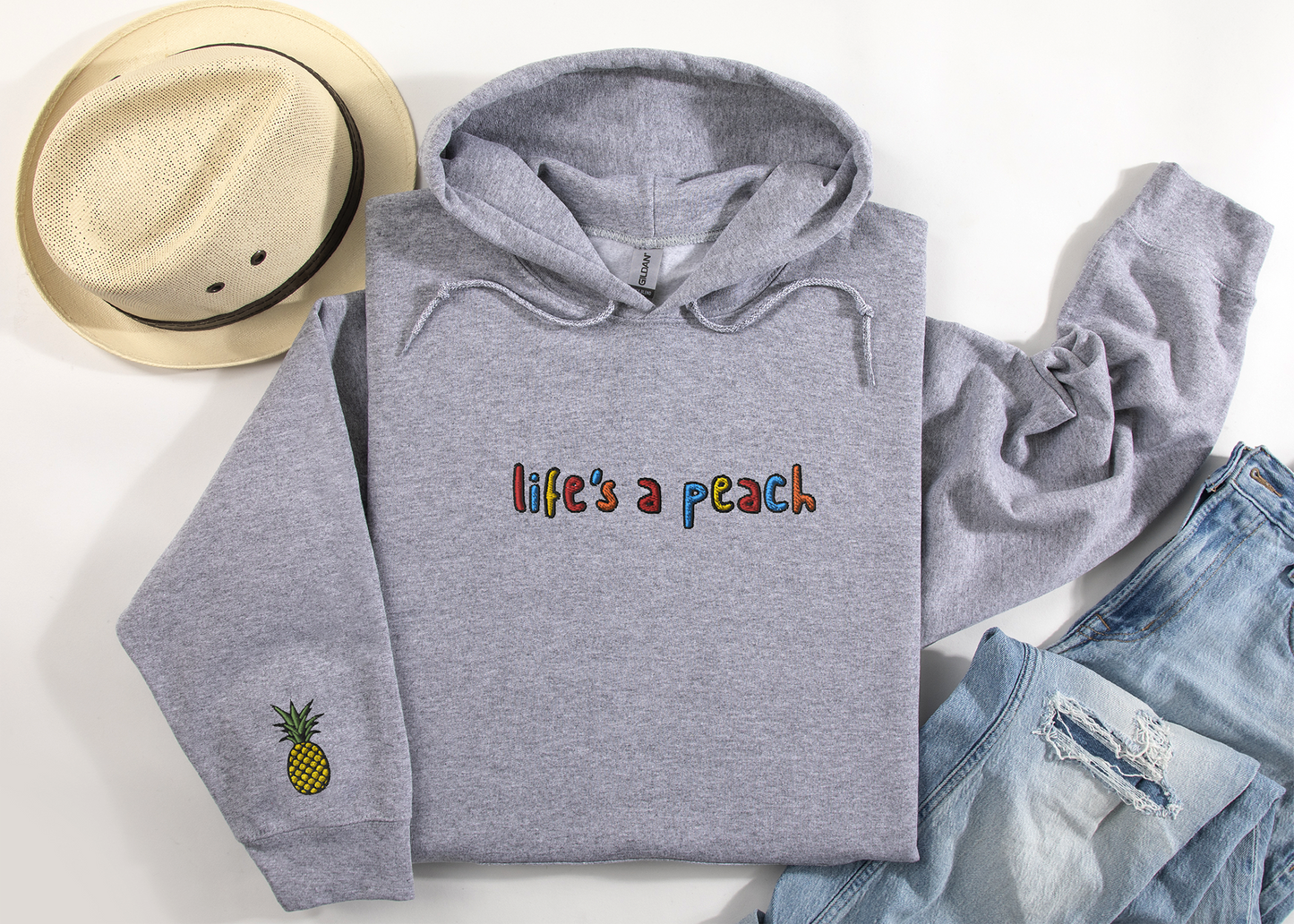 LIFE'S A PEACH - Embroidered Unisex Crewneck Hoodie