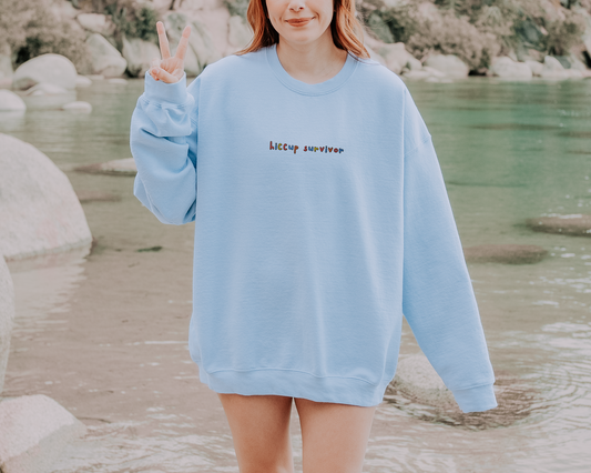 Hiccup Survivor - Embroidered Unisex Crewneck Sweatshirt